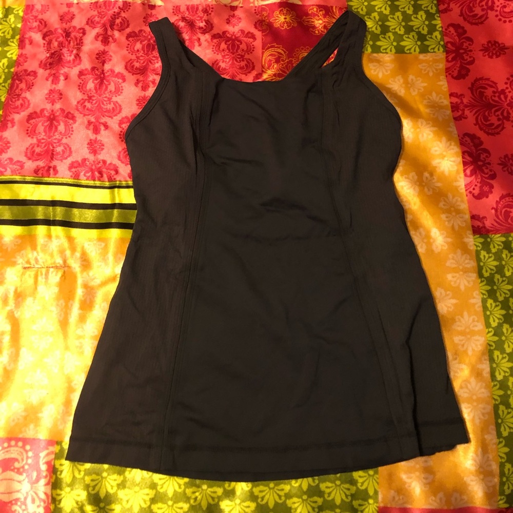 Lululemon sleeveless shirt, 10/10 conditions.